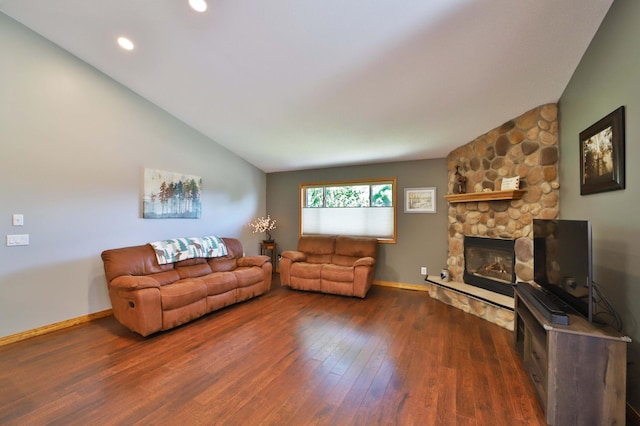 30467 Lakeview Dr, Breezy Point, MN 56472 - living area with dark wood-style flooring, vaulted ceiling, a stone fireplace, and recessed lighting