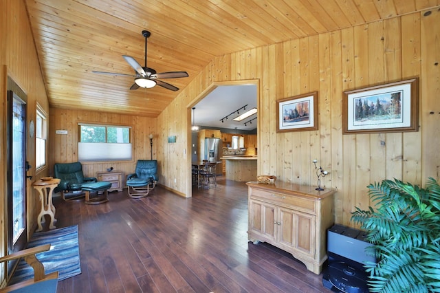 30467 Lakeview Dr, Breezy Point, MN 56472 - living area with wooden walls, lofted ceiling, a ceiling fan, dark wood-type flooring, and wooden ceiling