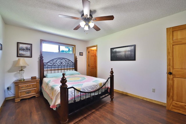 30467 Lakeview Dr, Breezy Point, MN 56472 - bedroom with dark wood-style flooring, a textured ceiling, and ceiling fan