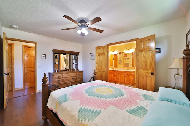30467 Lakeview Dr, Breezy Point, MN 56472 - bedroom with dark wood-style floors, ensuite bath, a ceiling fan, and a textured ceiling