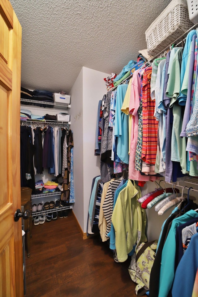 30467 Lakeview Dr, Breezy Point, MN 56472 - walk in closet featuring wood finished floors