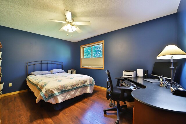 30467 Lakeview Dr, Breezy Point, MN 56472 - bedroom with wood finished floors, an office area, a ceiling fan, and a textured ceiling