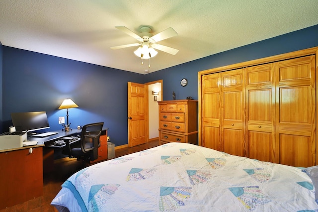 30467 Lakeview Dr, Breezy Point, MN 56472 - bedroom with wood finished floors, a closet, a ceiling fan, a desk, and a textured ceiling
