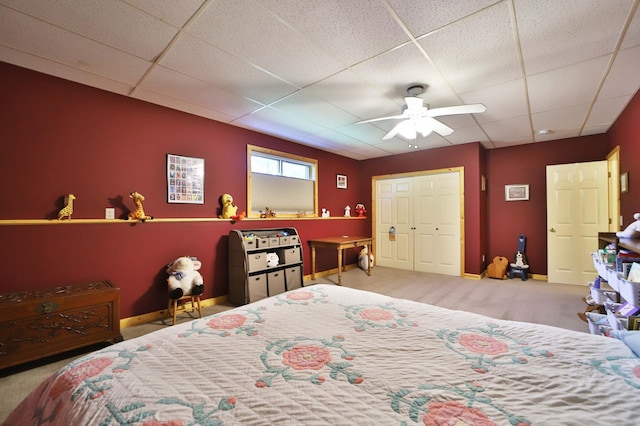 30467 Lakeview Dr, Breezy Point, MN 56472 - carpeted bedroom with a drop ceiling, a ceiling fan, and a closet