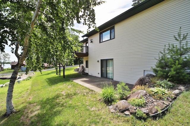 30467 Lakeview Dr, Breezy Point, MN 56472 - back of house with a lawn, a patio area, and a wooden deck