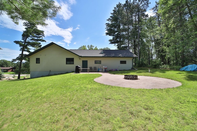 30467 Lakeview Dr, Breezy Point, MN 56472 - rear view of house featuring an outdoor fire pit, a lawn, and a patio