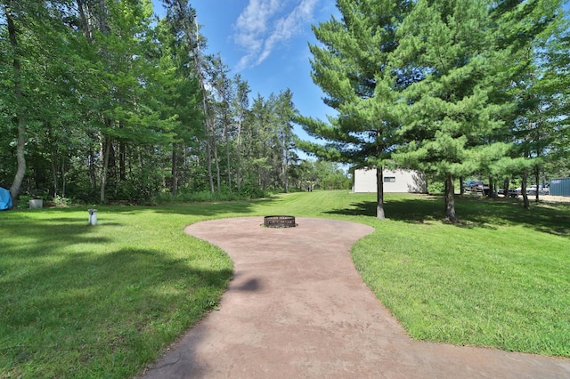 30467 Lakeview Dr, Breezy Point, MN 56472 - surrounding community with a fire pit and a yard