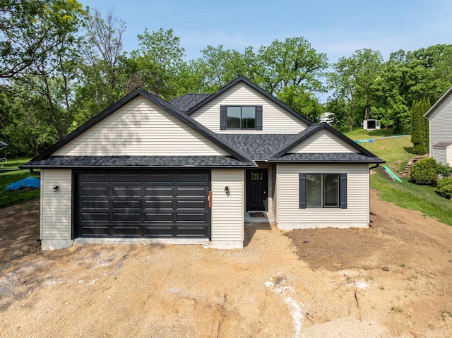 2529 Elmcroft Dr SW, Rochester, MN 55902 - view of front of home featuring roof with shingles