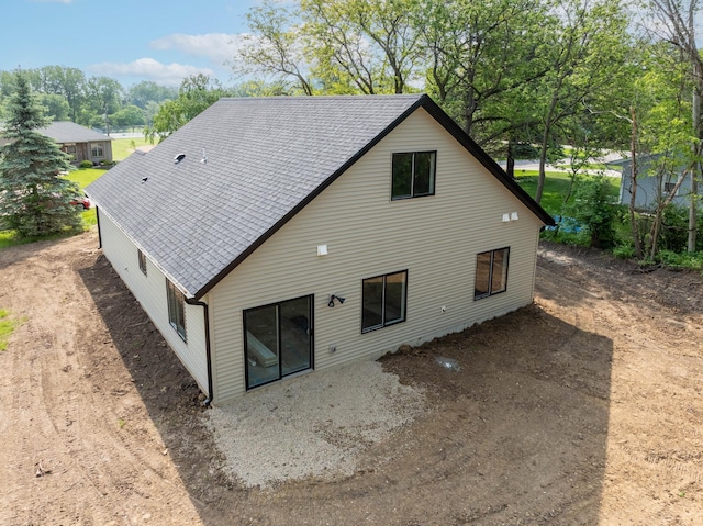 2529 Elmcroft Dr SW, Rochester, MN 55902 - rear view of house featuring roof with shingles