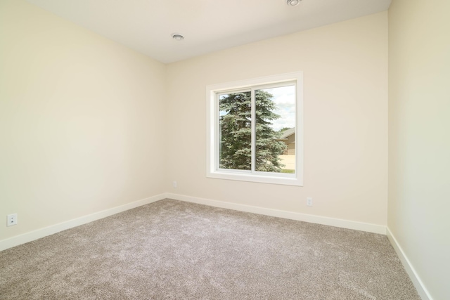 2529 Elmcroft Dr SW, Rochester, MN 55902 - unfurnished room with carpet floors and baseboards