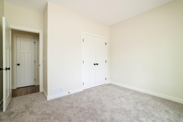 2529 Elmcroft Dr SW, Rochester, MN 55902 - unfurnished bedroom with carpet and a closet