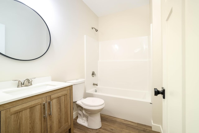 2529 Elmcroft Dr SW, Rochester, MN 55902 - full bath featuring wood finished floors, vanity, and bathtub / shower combination