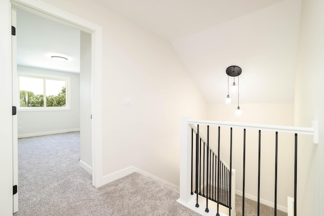 2529 Elmcroft Dr SW, Rochester, MN 55902 - corridor featuring an upstairs landing, carpet, and lofted ceiling