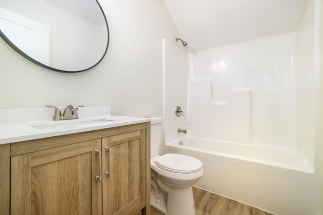 2529 Elmcroft Dr SW, Rochester, MN 55902 - bathroom featuring vanity, wood finished floors, and shower / bath combination