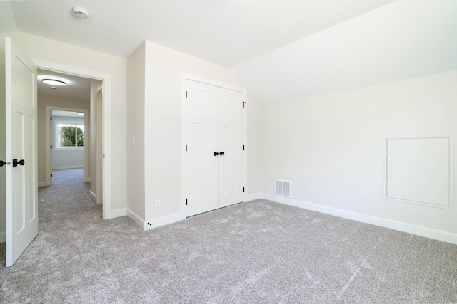 2529 Elmcroft Dr SW, Rochester, MN 55902 - bonus room featuring carpet floors and vaulted ceiling