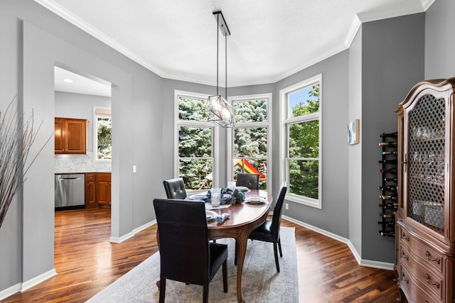 12346 Harvard Ave, Eden Prairie, MN 55347 - dining space with dark wood-style floors and ornamental molding