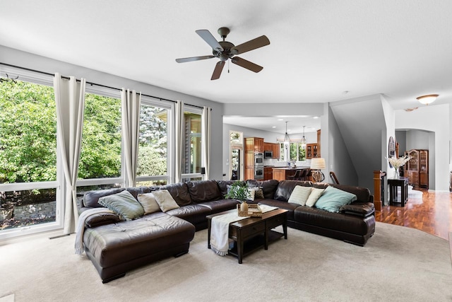 12346 Harvard Ave, Eden Prairie, MN 55347 - living room with a ceiling fan and light carpet