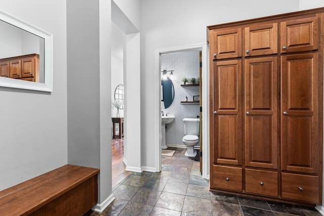 12346 Harvard Ave, Eden Prairie, MN 55347 - bathroom featuring stone tile flooring and toilet