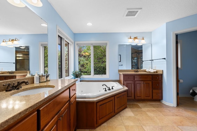 12346 Harvard Ave, Eden Prairie, MN 55347 - bathroom with a stall shower, two vanities, and a whirlpool tub
