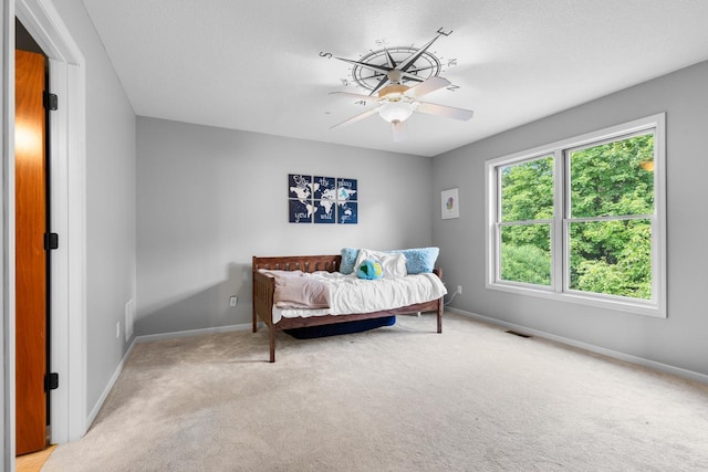 12346 Harvard Ave, Eden Prairie, MN 55347 - carpeted bedroom featuring baseboards and ceiling fan