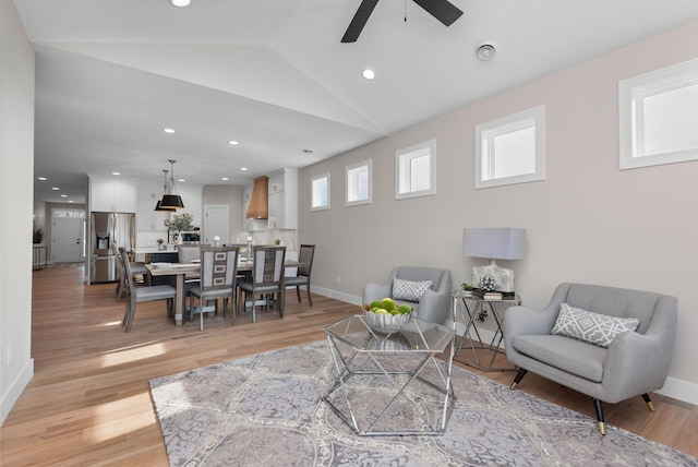 7617 Ocean Ave NE, Otsego, MN 55330 - living area with a ceiling fan, lofted ceiling, light wood-type flooring, and recessed lighting