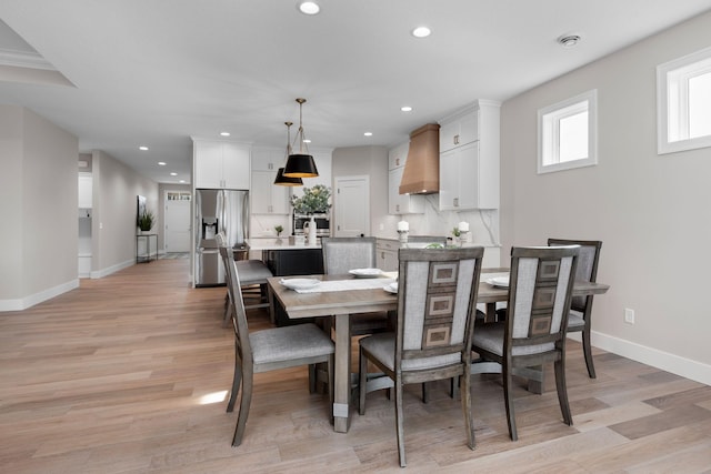 7617 Ocean Ave NE, Otsego, MN 55330 - dining room featuring light wood finished floors and recessed lighting