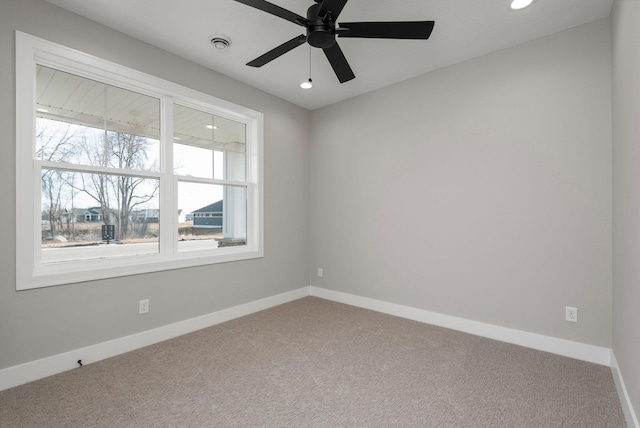 7617 Ocean Ave NE, Otsego, MN 55330 - spare room with carpet floors, a ceiling fan, and recessed lighting