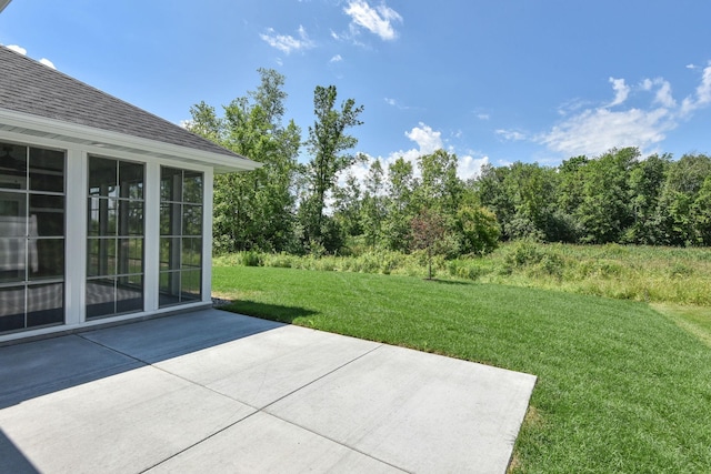 7617 Ocean Ave NE, Otsego, MN 55330 - view of grassy yard with a patio area
