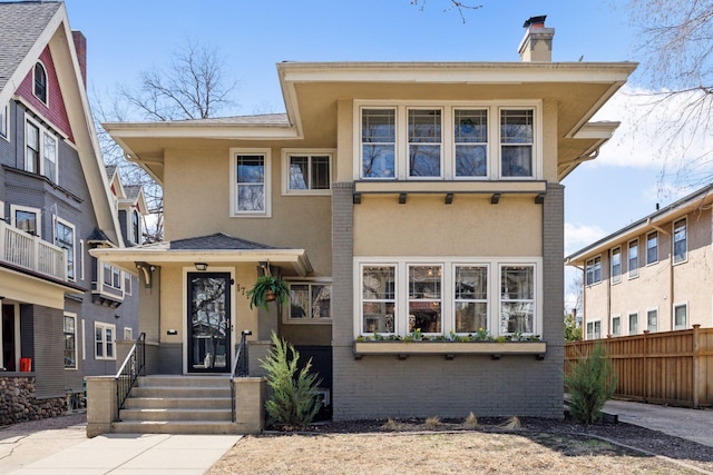 1770 Humboldt Ave S Unit 1, Minneapolis, MN 55403 - view of front of property with stucco siding and a chimney