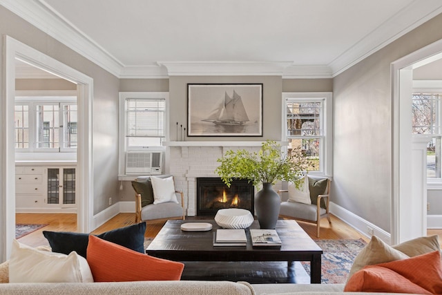 1770 Humboldt Ave S Unit 1, Minneapolis, MN 55403 - living room featuring crown molding, a brick fireplace, plenty of natural light, wood finished floors, and cooling unit