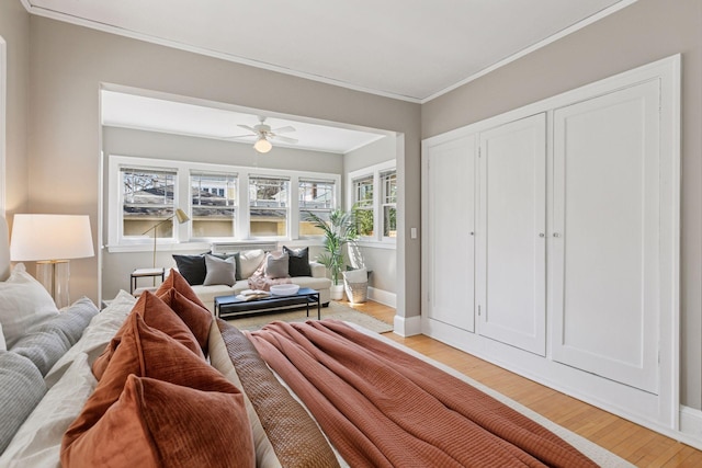 1770 Humboldt Ave S Unit 1, Minneapolis, MN 55403 - living area with light wood-style floors, ornamental molding, and a ceiling fan