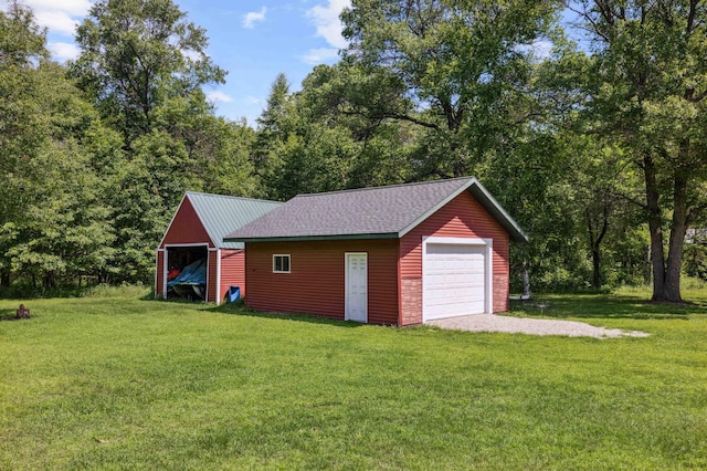 4745 Patterson Trl, Brainerd, MN 56401 - detached garage featuring gravel driveway