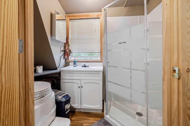 4745 Patterson Trl, Brainerd, MN 56401 - full bath featuring wood finished floors, a stall shower, and vanity