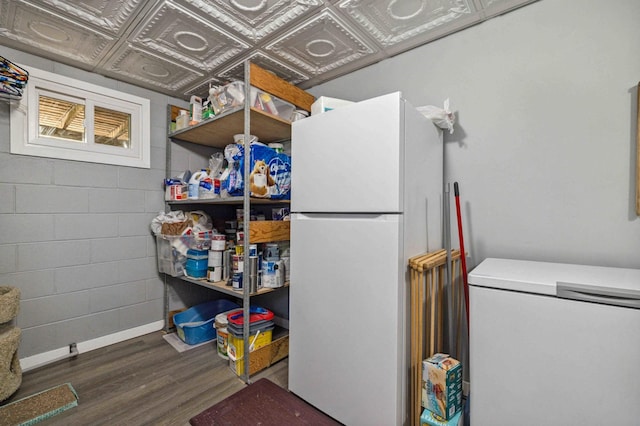 4745 Patterson Trl, Brainerd, MN 56401 - laundry area featuring wood finished floors and baseboards