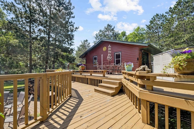 4745 Patterson Trl, Brainerd, MN 56401 - wooden terrace featuring a storage shed