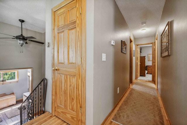 4745 Patterson Trl, Brainerd, MN 56401 - corridor with an upstairs landing and a textured ceiling