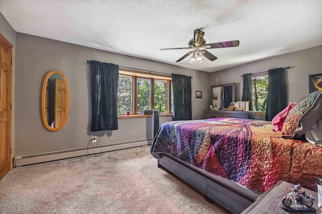 4745 Patterson Trl, Brainerd, MN 56401 - carpeted bedroom featuring a baseboard heating unit, a textured ceiling, and ceiling fan
