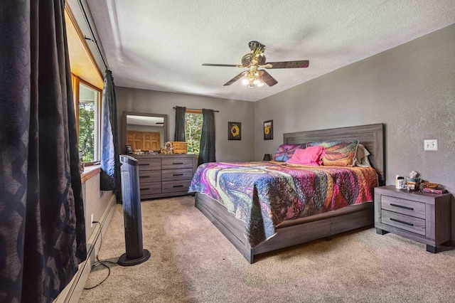 4745 Patterson Trl, Brainerd, MN 56401 - bedroom with carpet floors, a textured ceiling, and ceiling fan