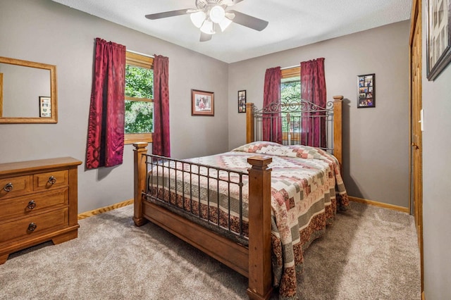 4745 Patterson Trl, Brainerd, MN 56401 - carpeted bedroom with baseboards and a ceiling fan