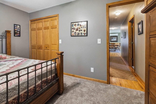 4745 Patterson Trl, Brainerd, MN 56401 - bedroom featuring light colored carpet, a closet, and a textured ceiling