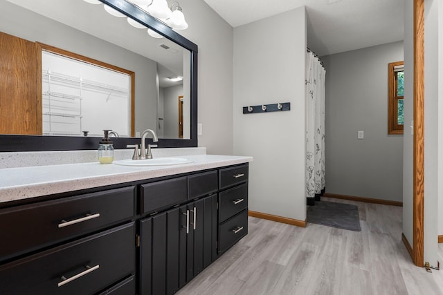 621 Twelve Oaks Ln, Hudson, WI 54016 - bathroom with vanity and wood finished floors