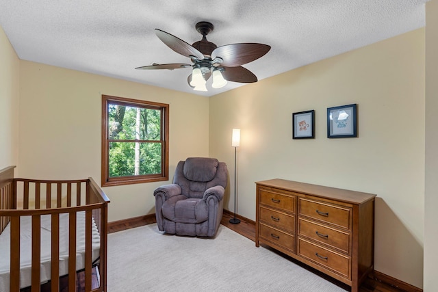 621 Twelve Oaks Ln, Hudson, WI 54016 - bedroom with a textured ceiling and ceiling fan