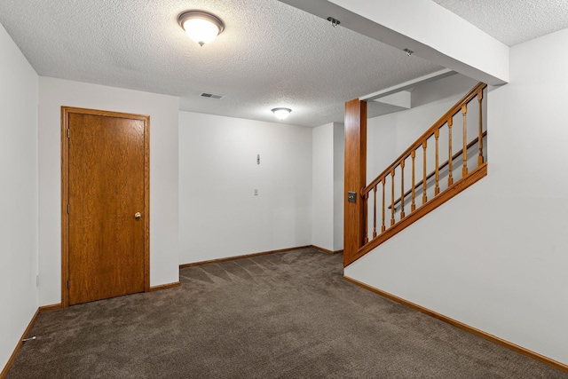 621 Twelve Oaks Ln, Hudson, WI 54016 - carpeted empty room with a textured ceiling and stairway
