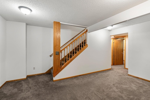 621 Twelve Oaks Ln, Hudson, WI 54016 - finished basement featuring carpet, stairway, and a textured ceiling