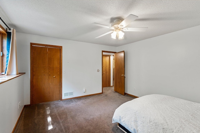 621 Twelve Oaks Ln, Hudson, WI 54016 - bedroom with carpet, a textured ceiling, and a ceiling fan