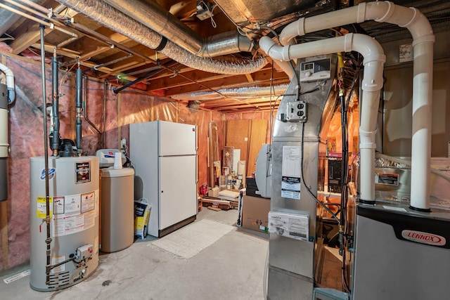 621 Twelve Oaks Ln, Hudson, WI 54016 - unfinished basement with gas water heater, freestanding refrigerator, a water softener, and heating unit