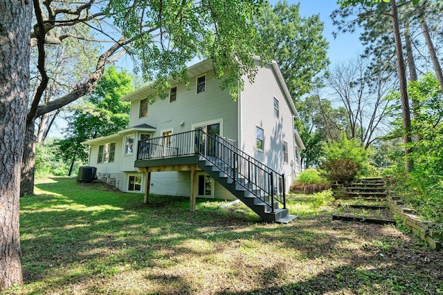 621 Twelve Oaks Ln, Hudson, WI 54016 - back of property featuring stairs, a wooden deck, and a yard