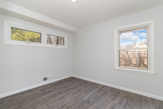 11509 Palmer Rd, Bloomington, MN 55437 - unfurnished room featuring dark wood finished floors, healthy amount of natural light, and recessed lighting