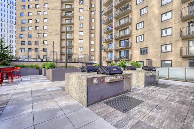 121 Washington Ave S Unit 513, Minneapolis, MN 55401 - view of patio with an outdoor kitchen