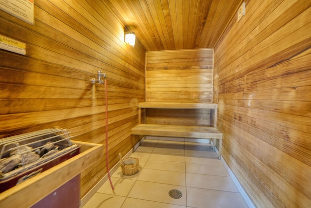 121 Washington Ave S Unit 513, Minneapolis, MN 55401 - relaxing sauna / steam room with wooden walls, tile patterned floors, and wood ceiling
